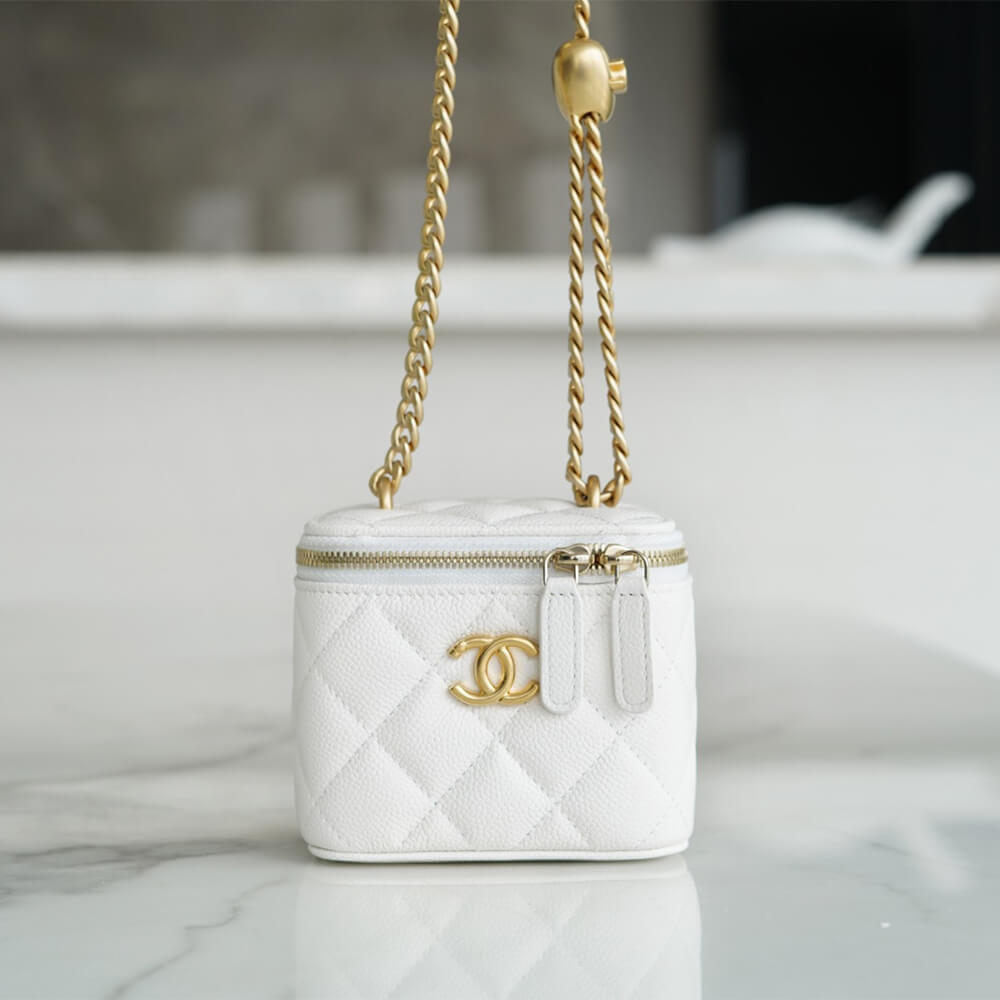 Chanel small gold ball makeup bag - Image 2